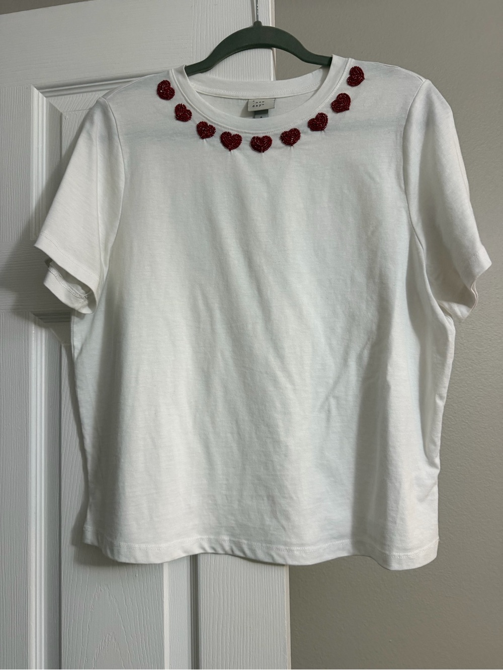 a new day White Tee with Red beaded Hearts